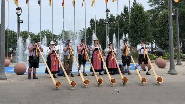 Alphorn players performing at the entrance to Milwaukee GermanFest.