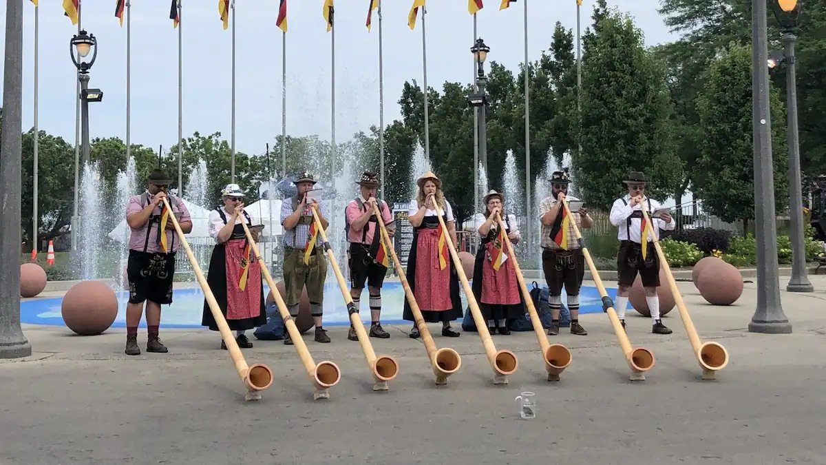 Alphorn players performing at the entrance to Milwaukee GermanFest.