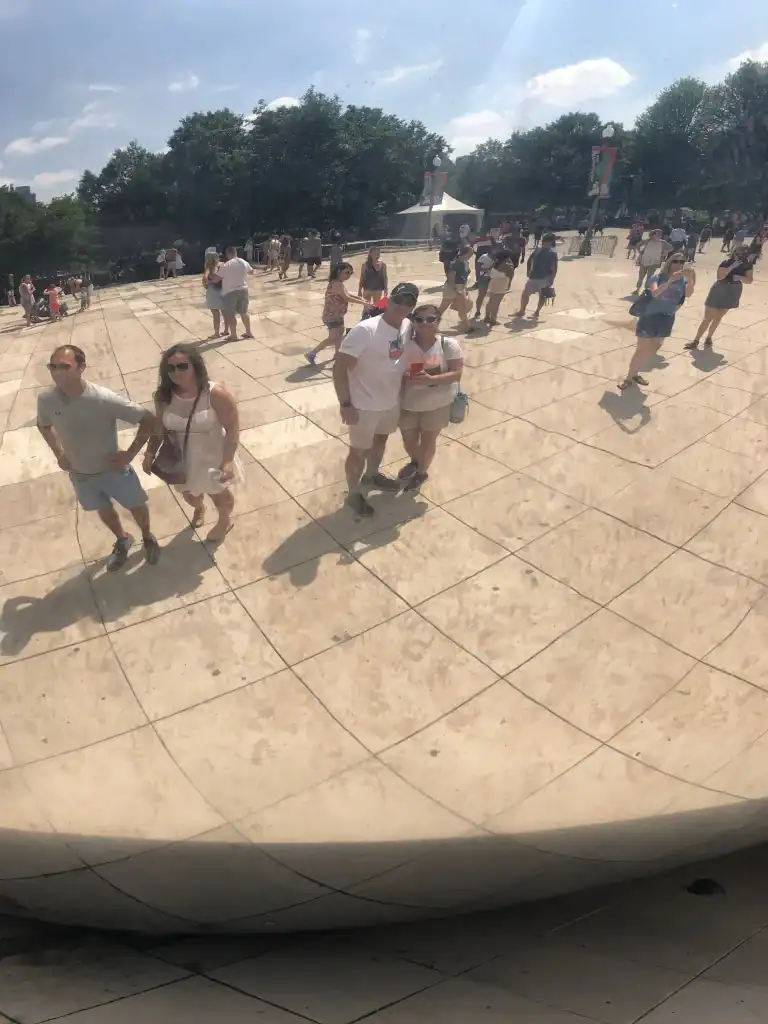 Matt and Linda reflected in Chicago Bean during 97-degree heat wave