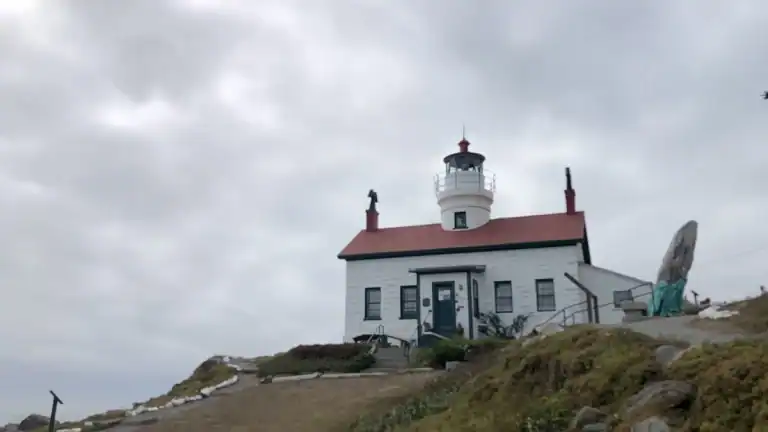 Battery Point Lighthouse Crescent City California white building with red roof and tower
