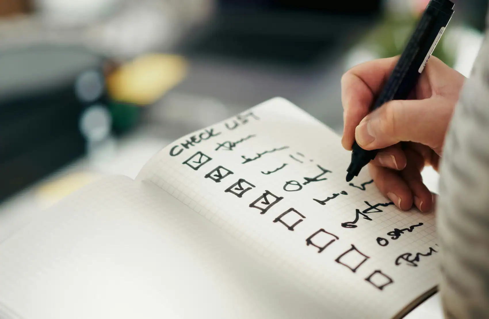 Checklist in a notebook representing intentional living and small daily choices