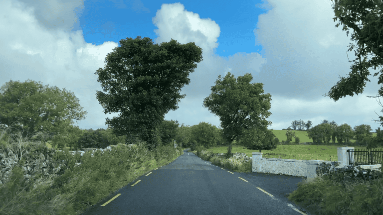 Narrow country road in Ireland where driving is the adventure